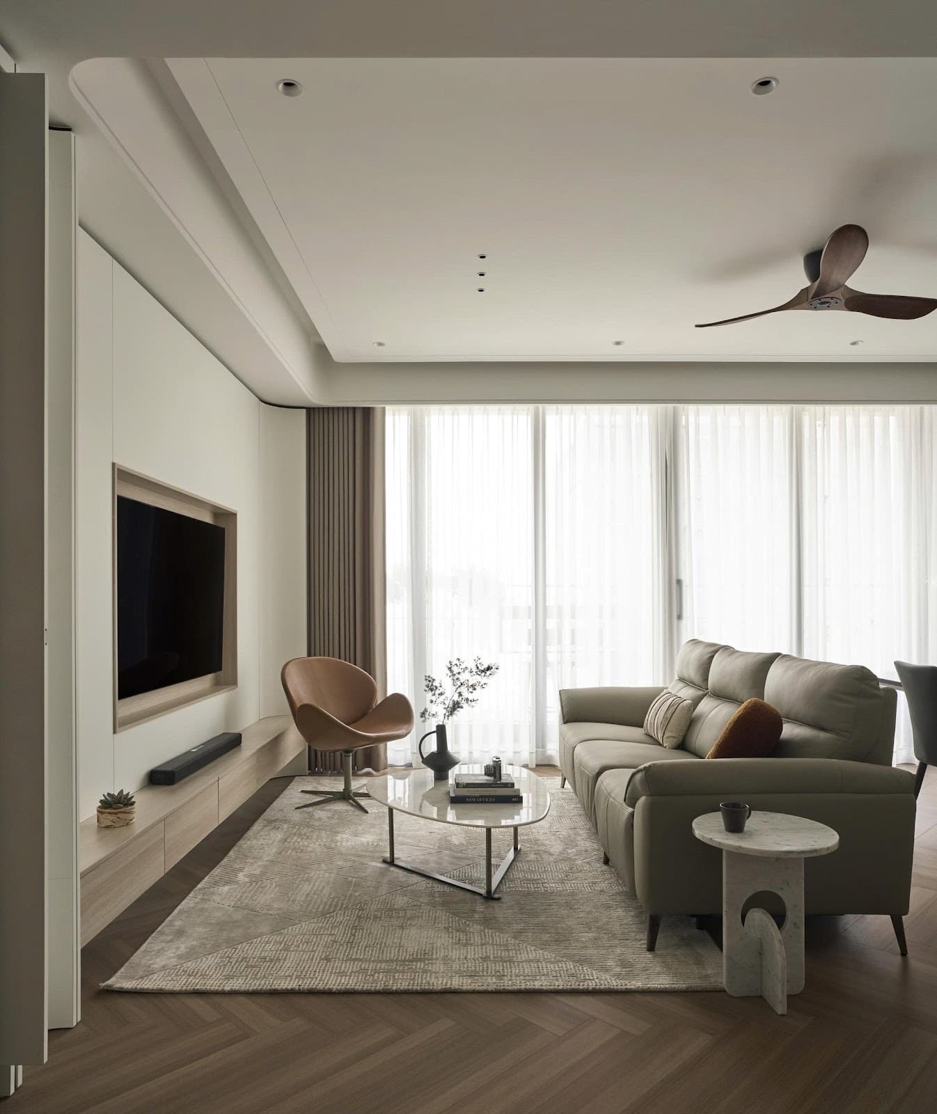 Close up of architect hands working on detailed interior design blueprints with high-end fabric samples and wood swatches Close up of architect hands working on detailed interior design blueprints with high-end fabric samples and wood swatches